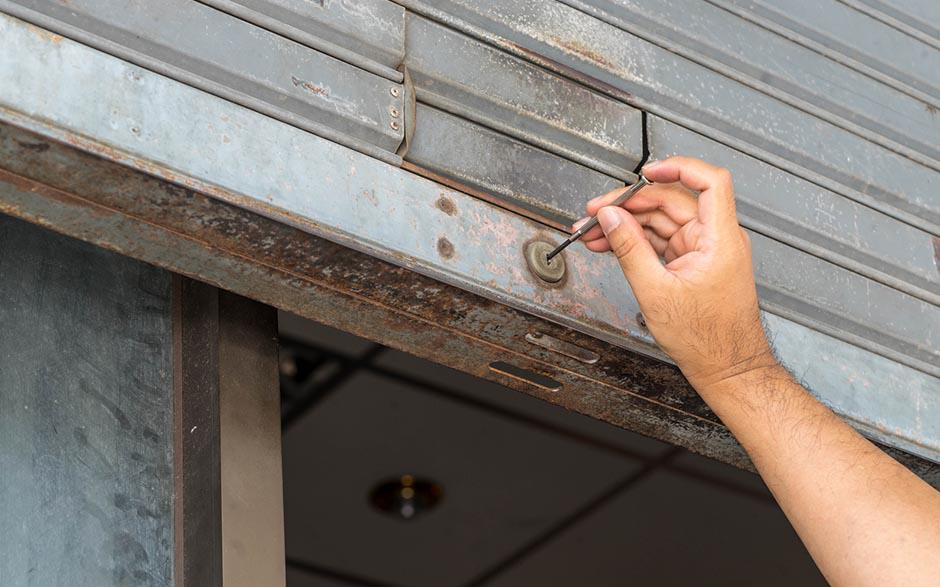 changer serrure porte garage basculante Noyon